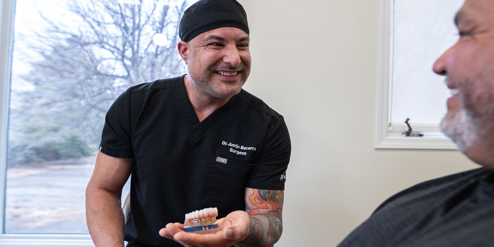 dr b showing full arch dental implant model