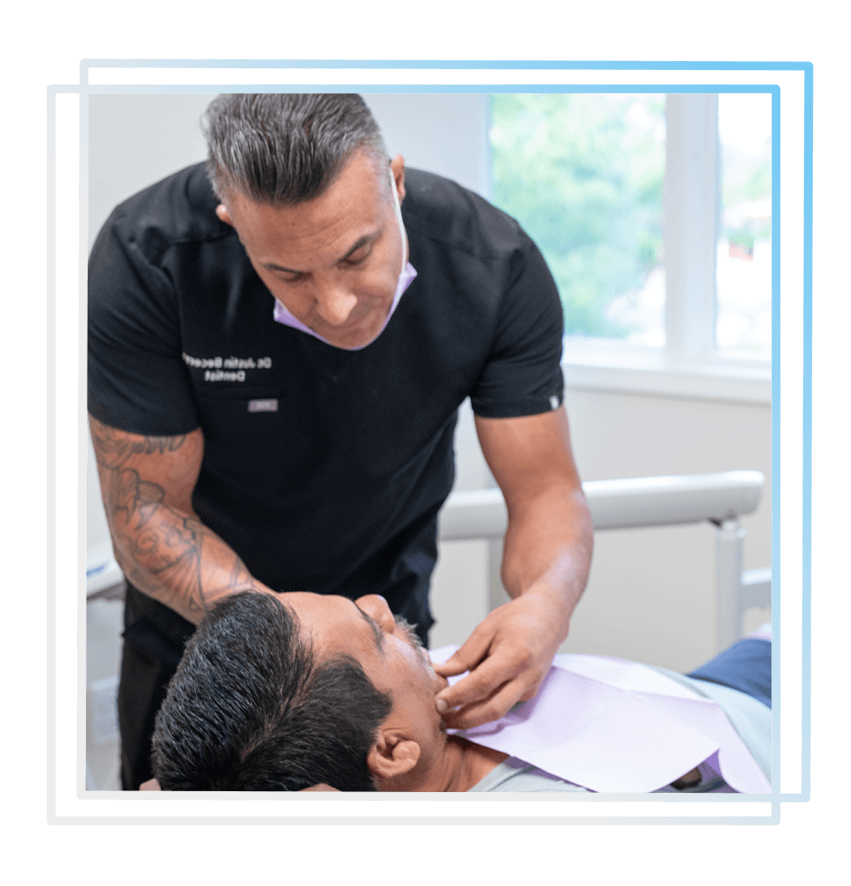 doctor examining dental patient for their dental treatment