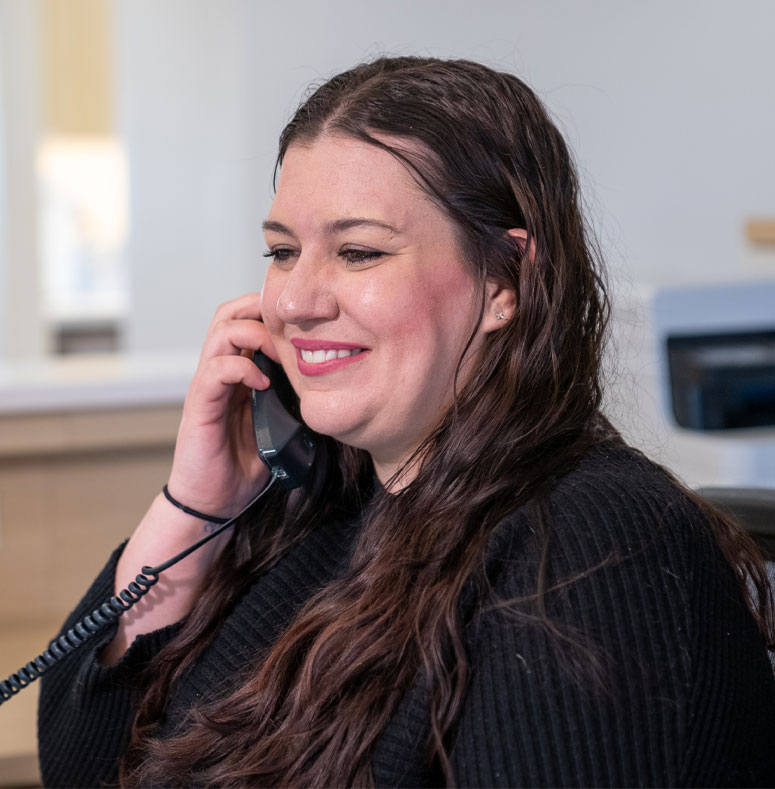 team member on phone